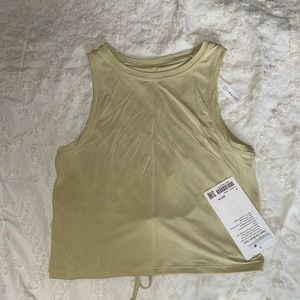 lululemon cropped tank! light green color, size 6! open back that ties!